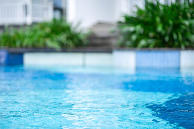 A close-up of a sparkling backyard pool.