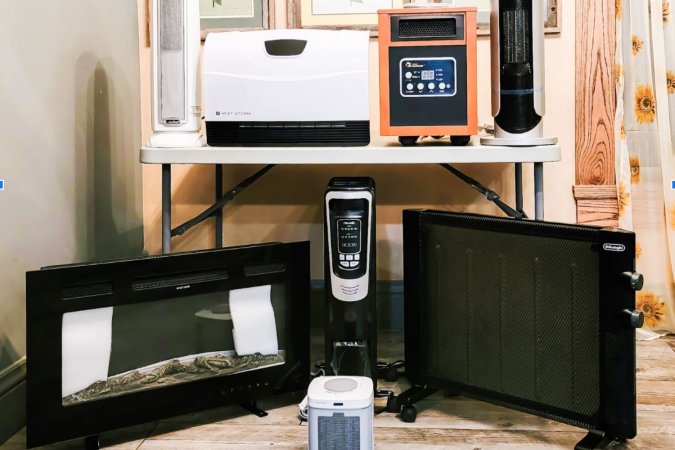 A group of the best energy-efficient space heaters together with some on a table and some on the floor.