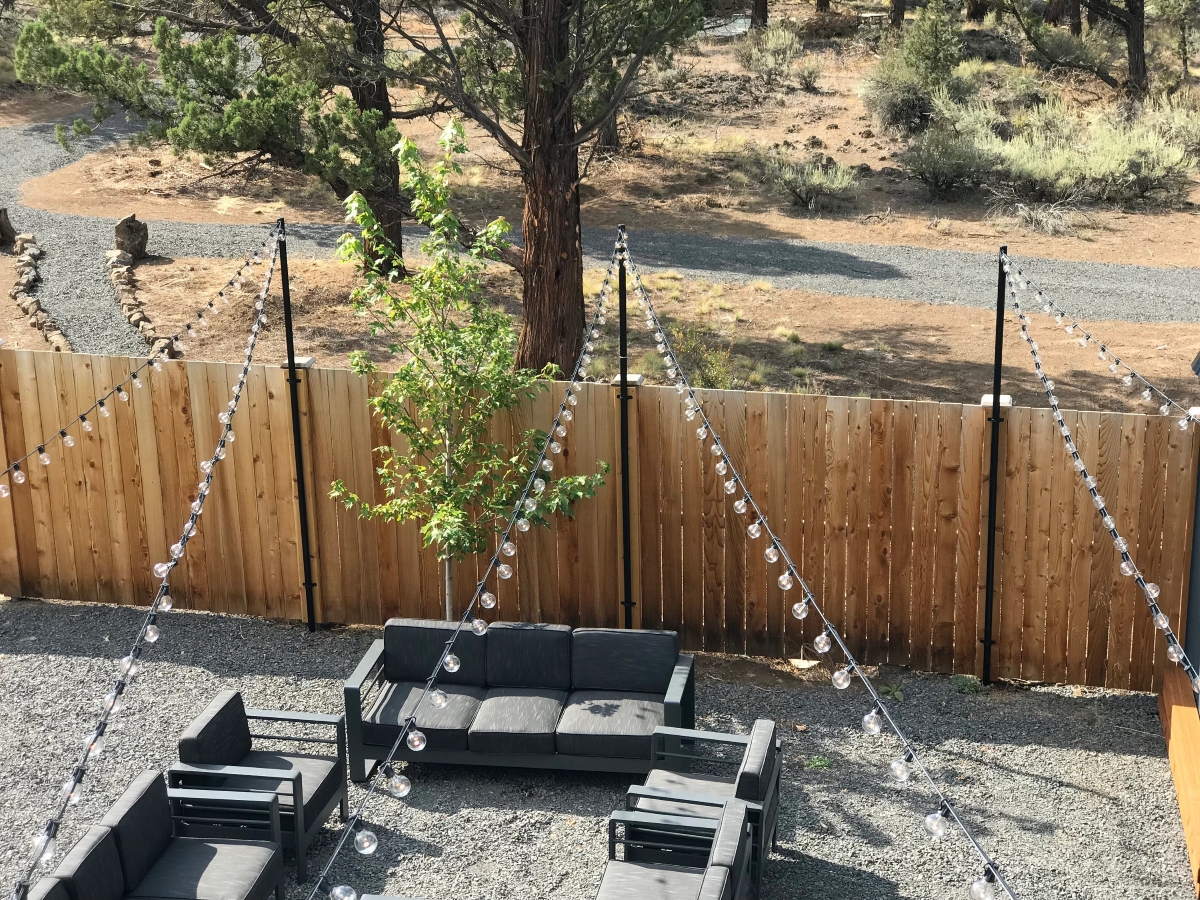 Aerial view of backyard with string lights