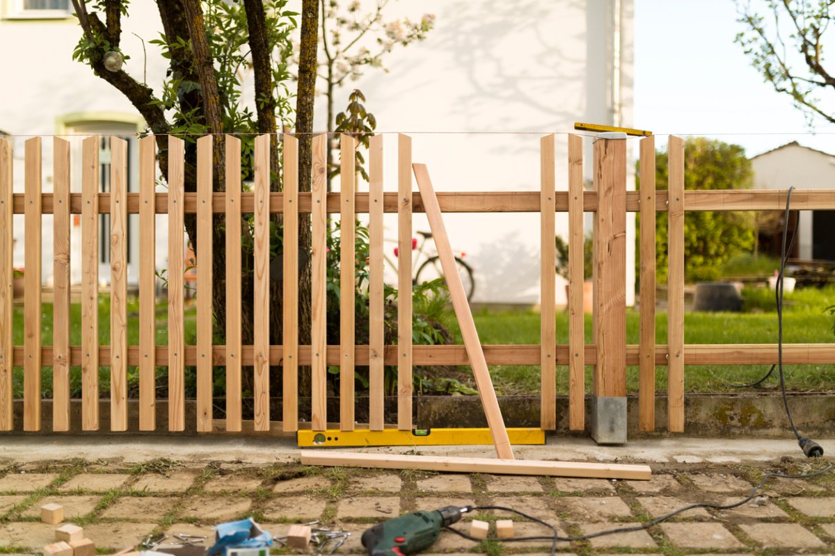 building a new wooden natural fence - work tools