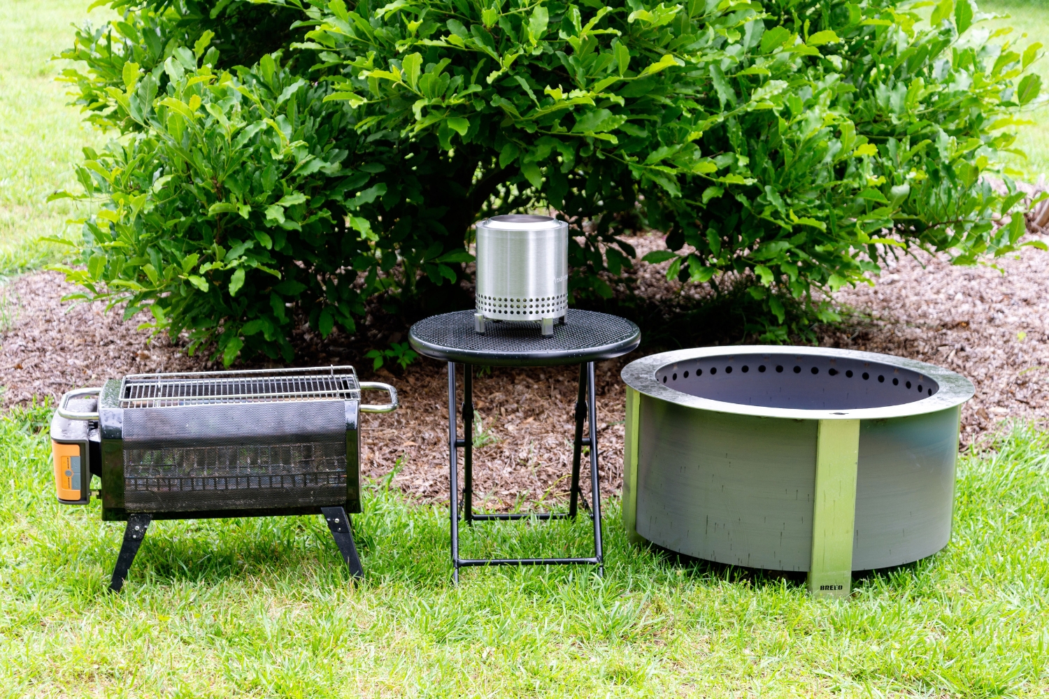 Three of the best fire pits in a yard before testing.