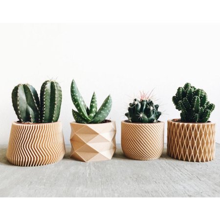  The Best Gifts for Plant Lovers Option: Set of 4 Small Indoor Planters