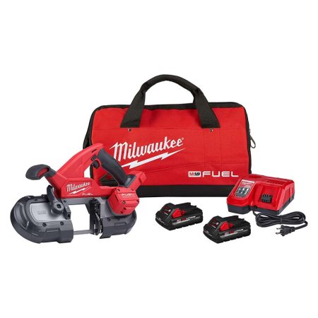  The Milwaukee 2829-22 M18 Fuel Compact Band Saw Kit spread out on a white background.