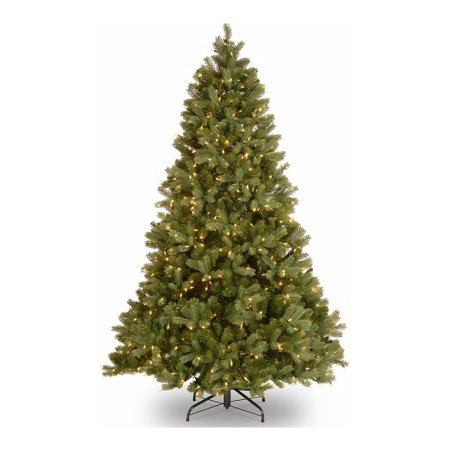  The National Tree Company Full Downswept Christmas Tree in its included stand on a white background.