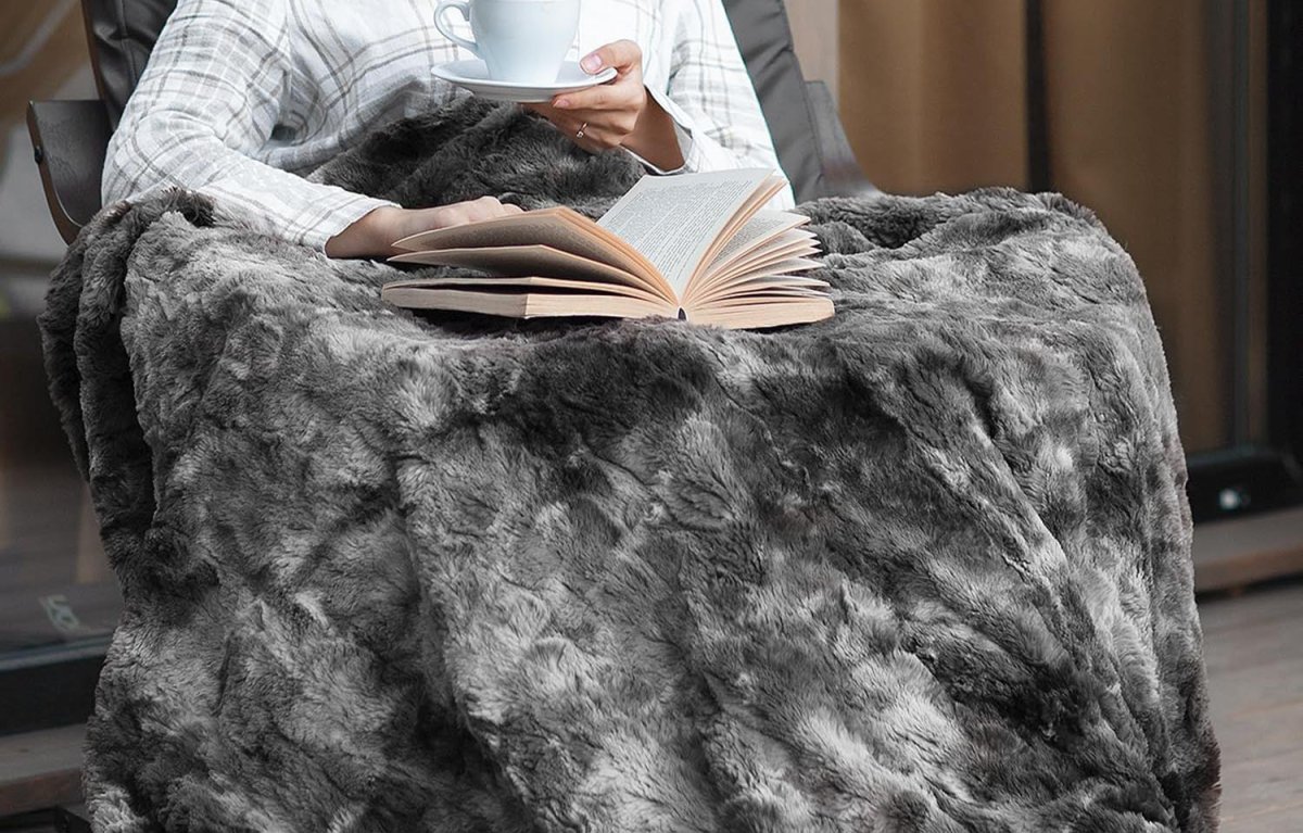 The Best Gifts for New Homeowners Option Everlasting Comfort Faux Fur Throw Blanket