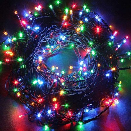  The Twinkle Star 66-Foot 200 LED Fairy String Lights arranged in a circle on a dark background.