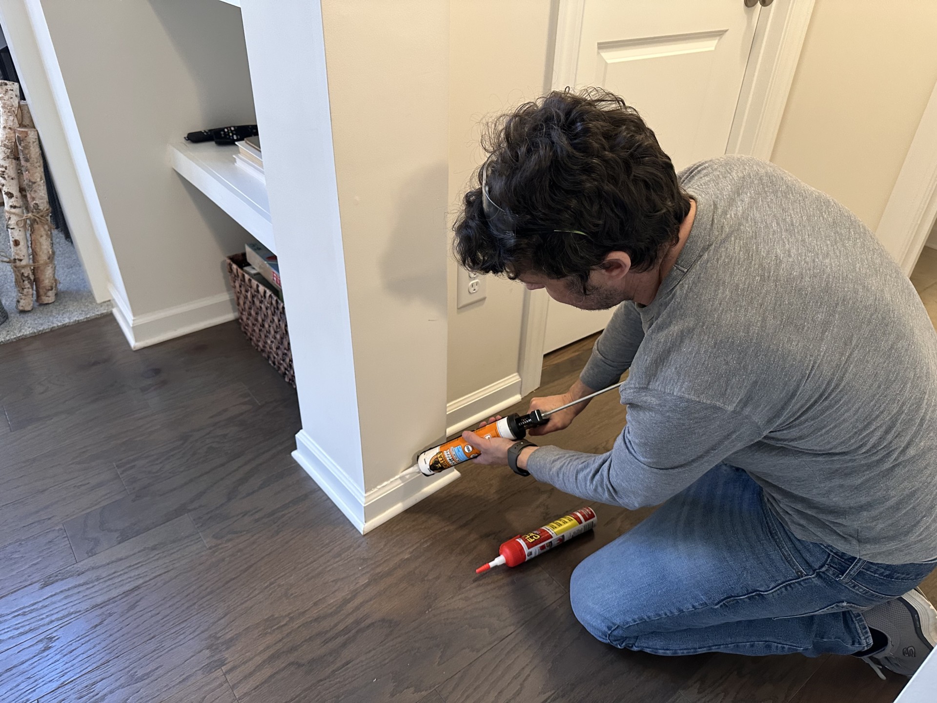 Gorilla Caulk for Baseboards in use