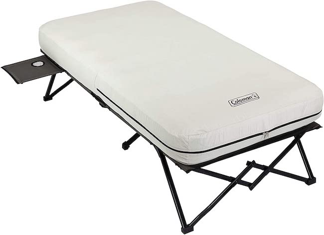 Coleman camping cot on a white background.