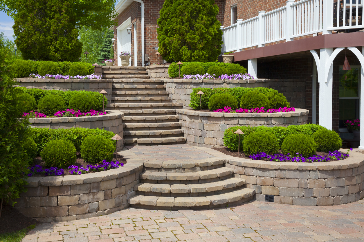 Nicely paved backyard steps with stones.