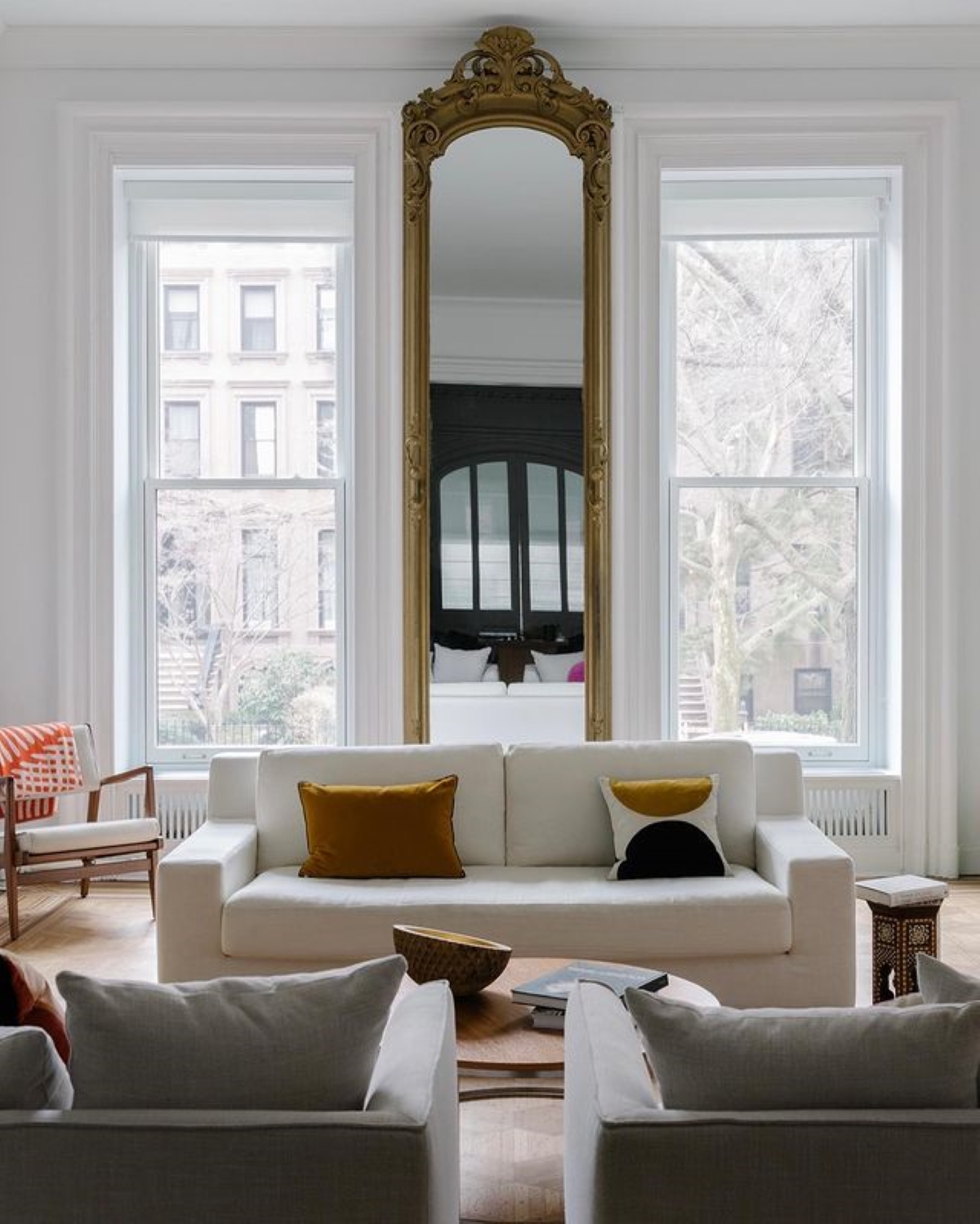 Living room with large mirror.