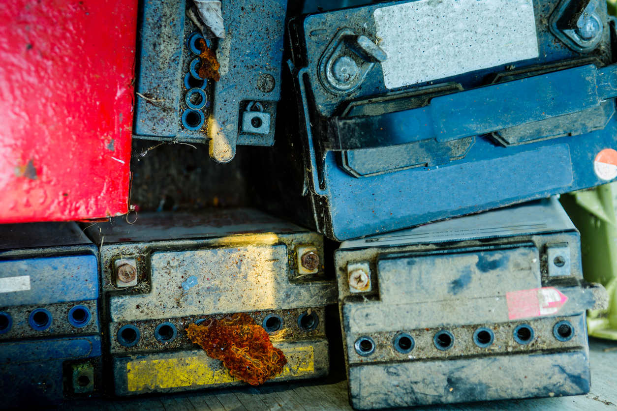 A pile of car batteries to be recycled.