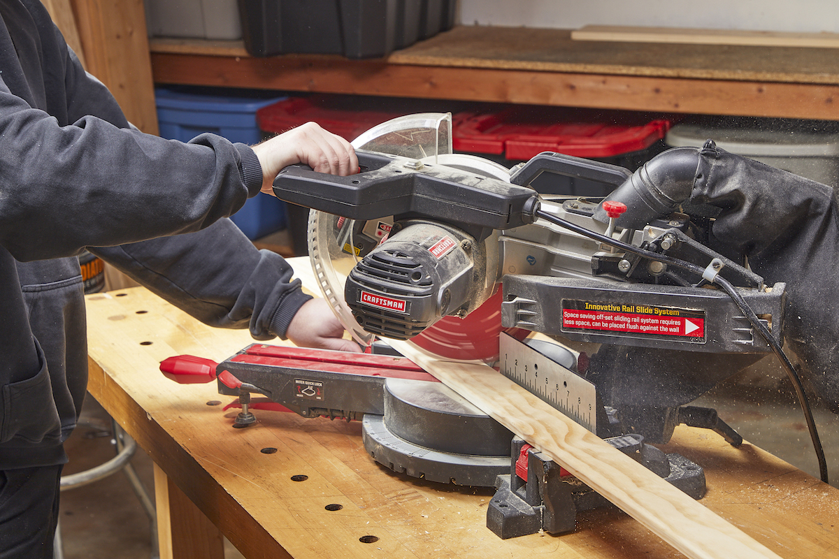 Miter cut on wood with a miter saw.