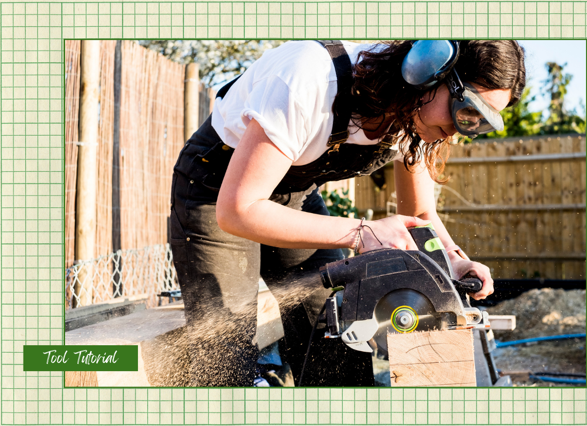 A DIYer using a circular saw to cut a wood board outside her home.