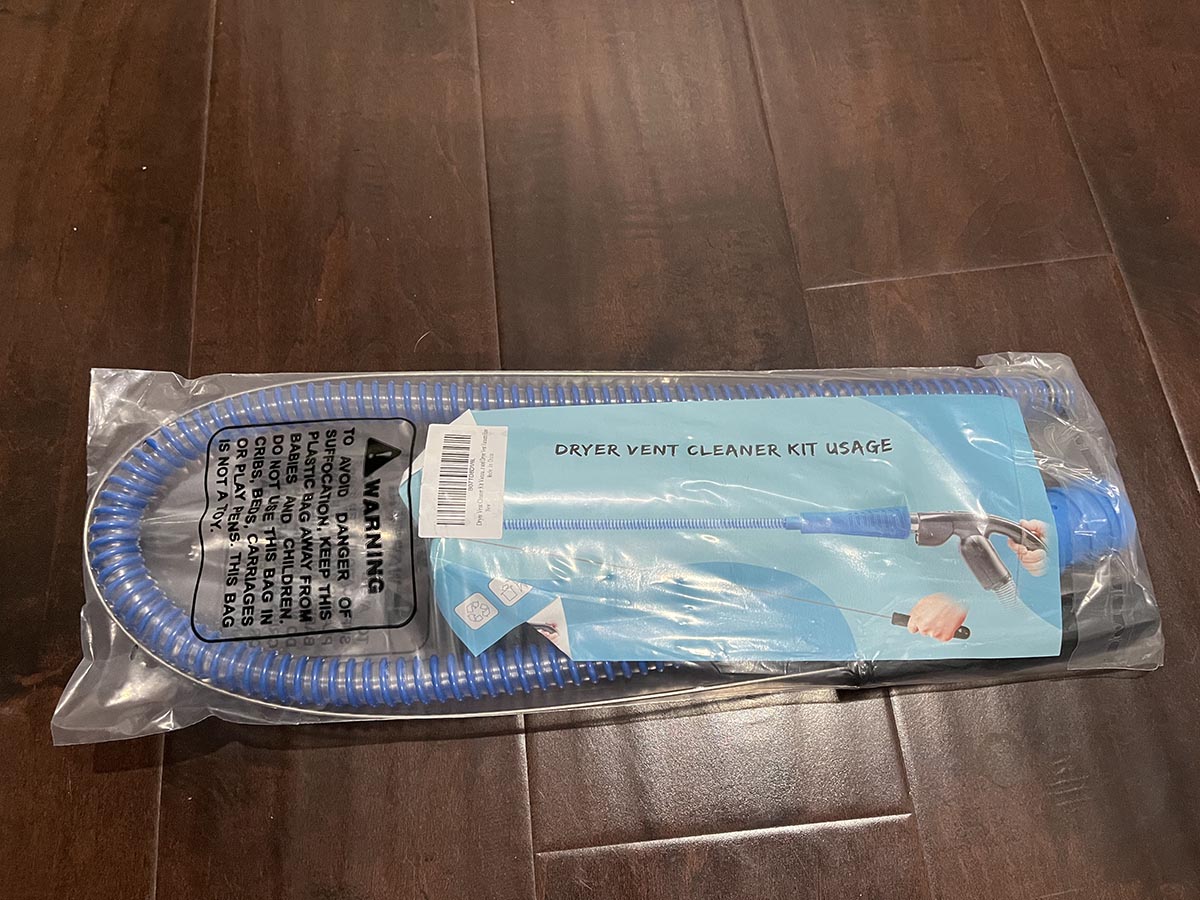 The Sealegend Vacuum Hose Dryer Vent Cleaner Kit in its packaging before testing.