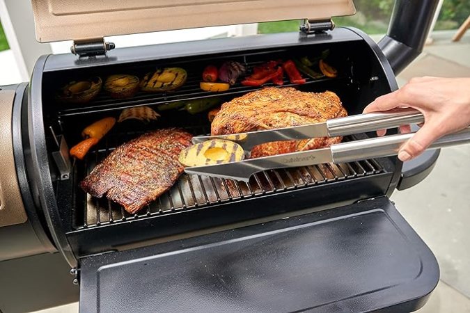 Person using grilling tongs