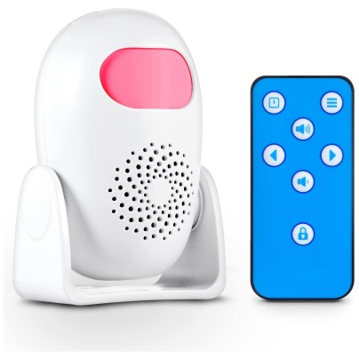 Towode Motion Sensor Alarm next to a smartphone on a white background