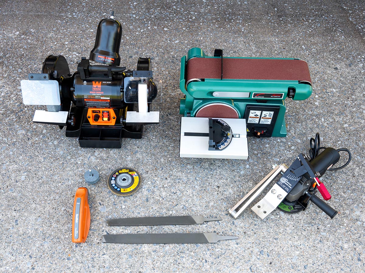 Eight of the Best Lawn Mower Blade Sharpener on a garage floor