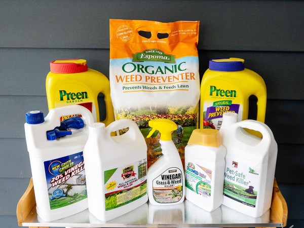 8 of the Best Weed Killer for Flower Beds Options sitting on table