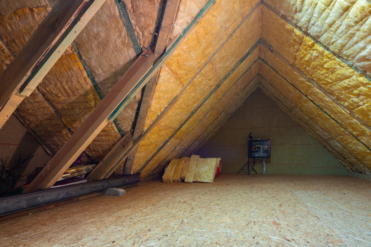 Batt insulation in a home's attic rafters.