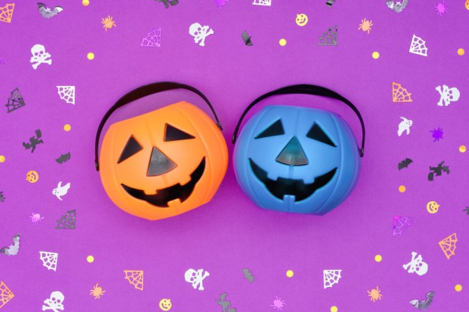 Orange and blue pumpkin candy buckets