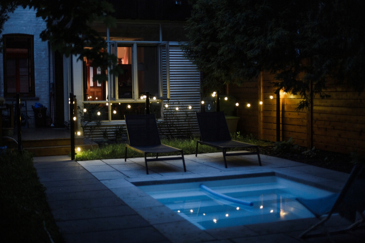 12 Pool Lighting Options That Will Keep Your Outdoor Space Aglow