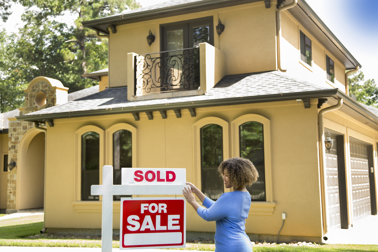 old houses for sale real estate agent standing in front of historic home