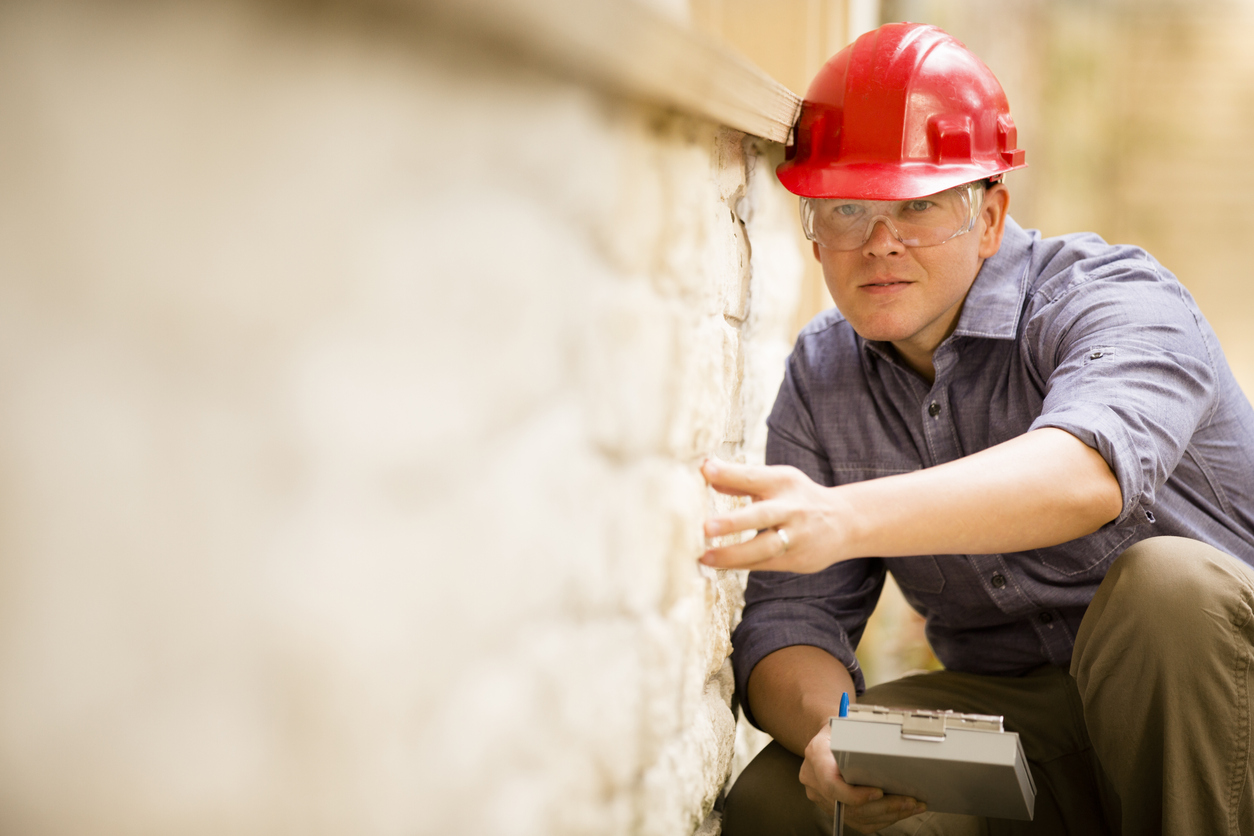 old houses for sale inspecting wall structure