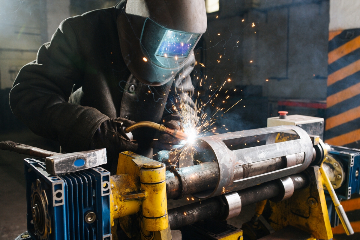 mig vs. tig welding - welder using torch