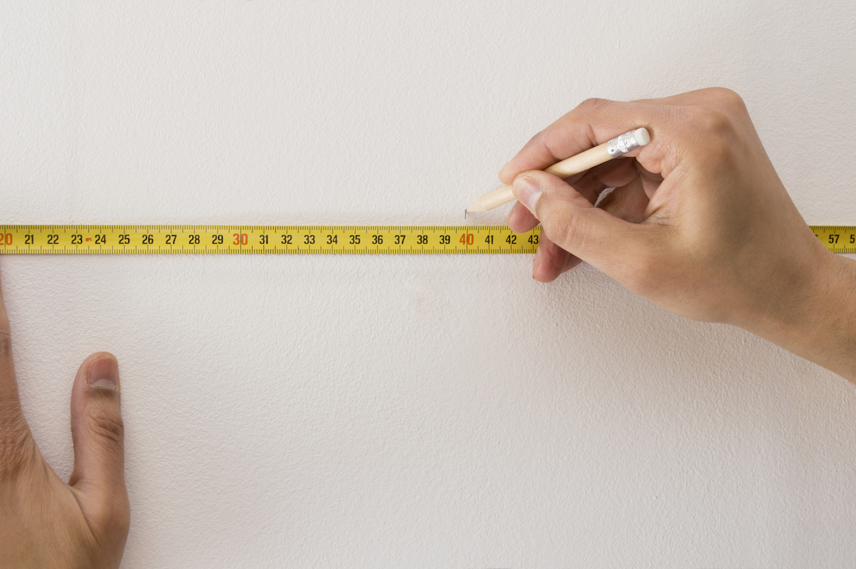 diy board and batten wall - marking center of wall