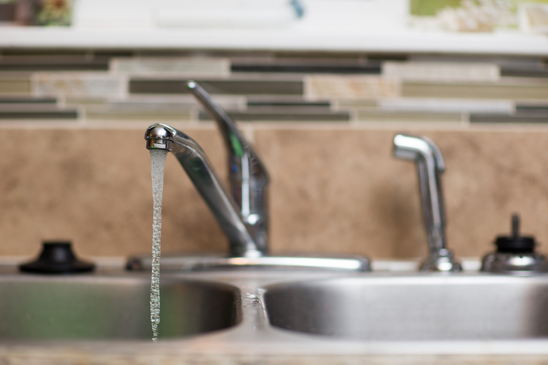 kitchen sink with the water running