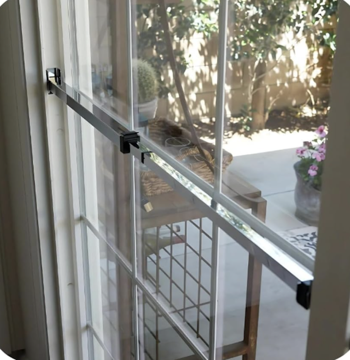 A steel patio bar that locks a sliding door. 