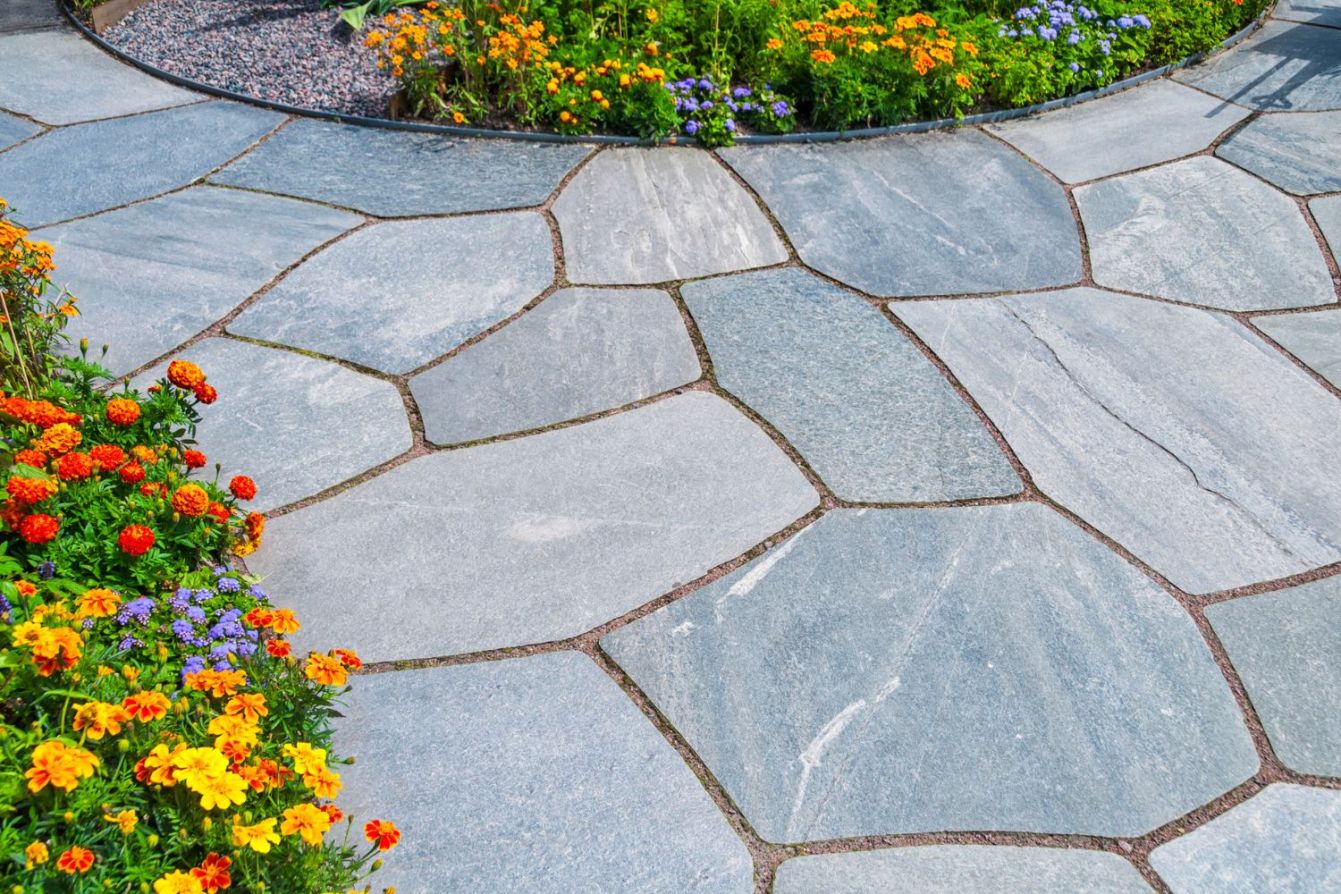 What Does Installing a Flagstone Patio Cost? (2023) Bob Vila