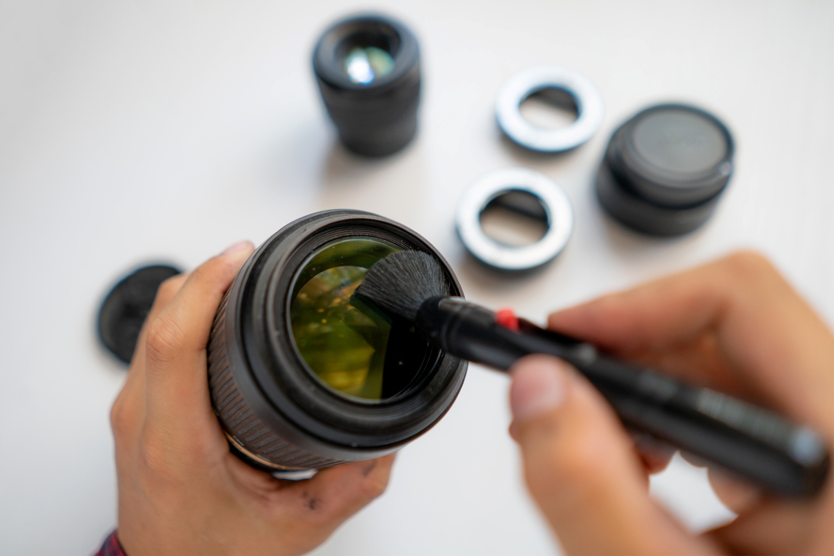 electronics you never clean - using brush to clean camera lens