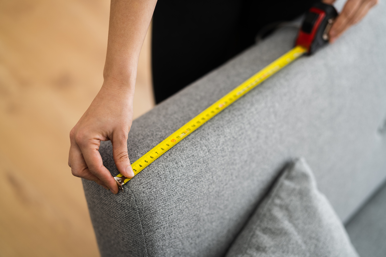 how to reupholster a couch using tape measure on gray couch