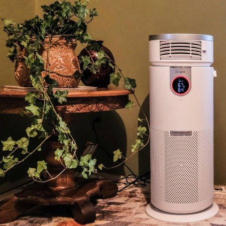 Shark Max Air Purifier with True HEPA next to table in room