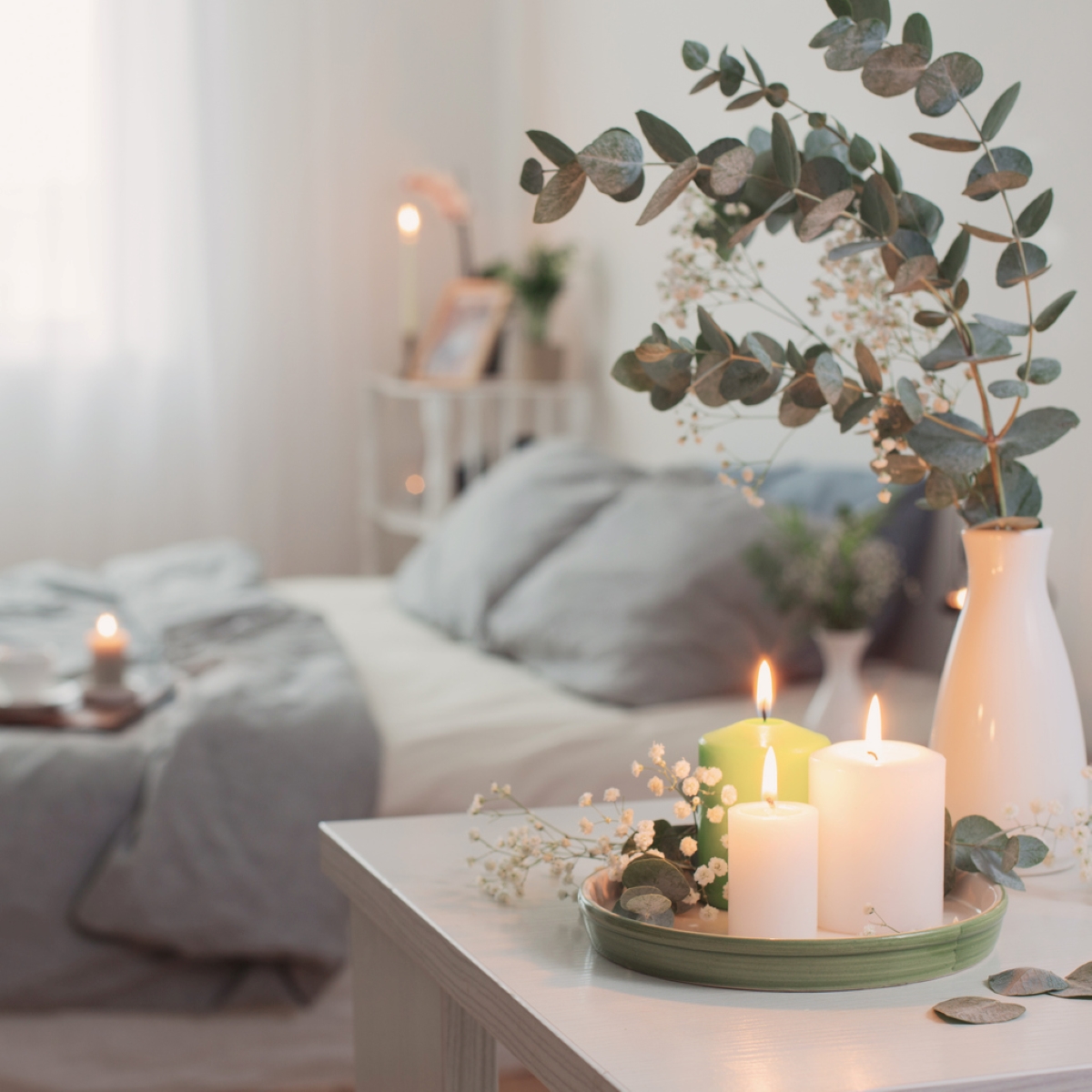 decor with candles - three candles on tray near bed