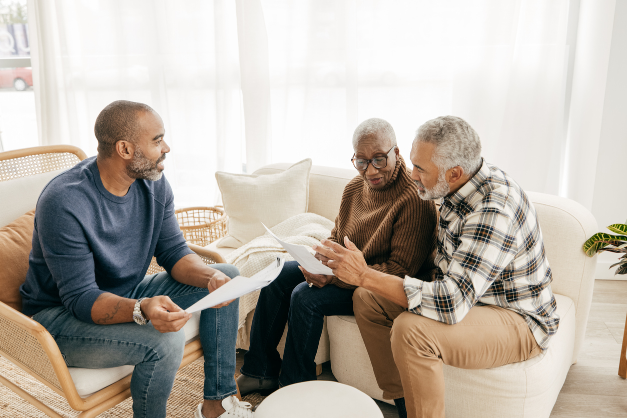 iStock-1352163252 master planned community older parents talking to kid