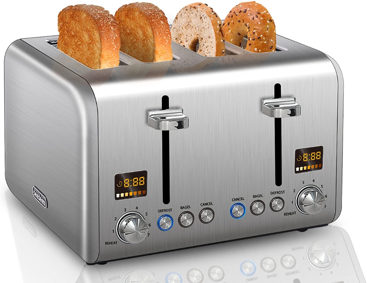 Modern silver toaster on a white background.