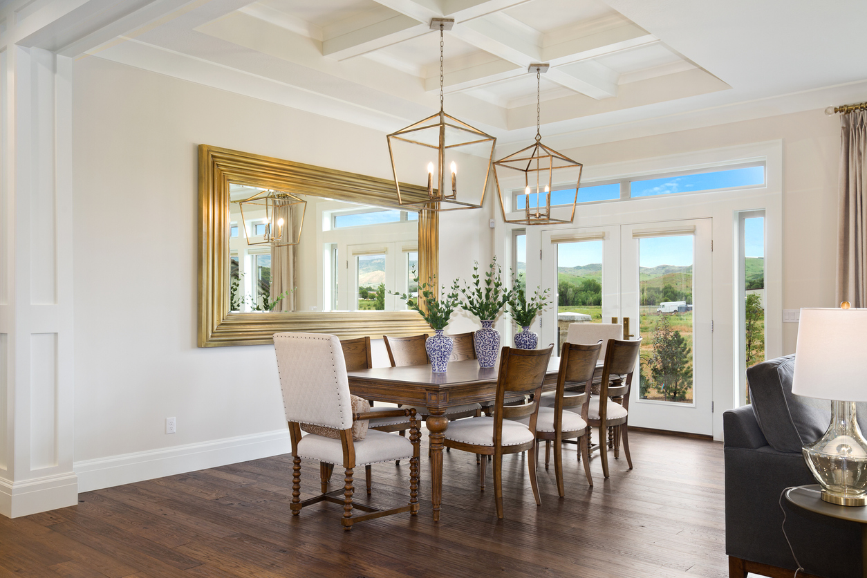 Staged furnishings in beautiful new luxury home with hardwood flooring