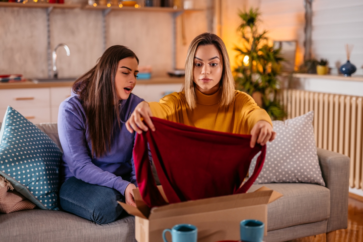 Woman surprised by red clothing gift