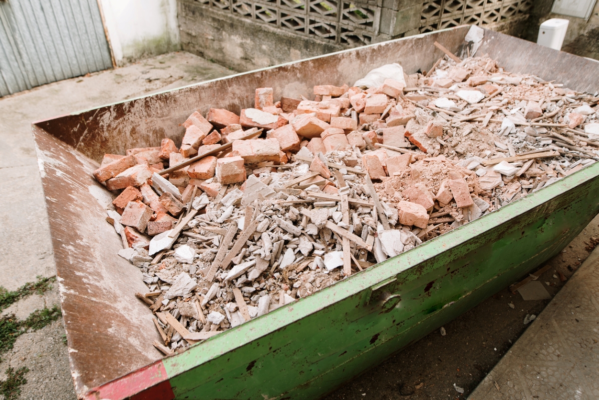 Dumpster full of concrete debris