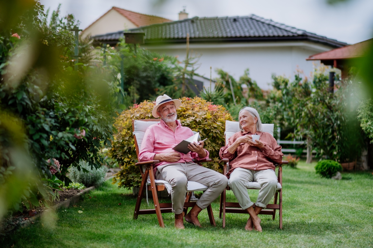 Couple relaxing in their garden