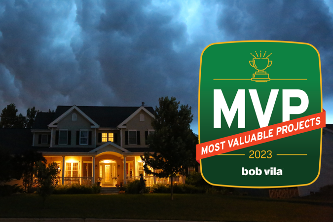 home with lights on with storm overhead and Bob Vilas most valuable projects 2023 graphic overlay