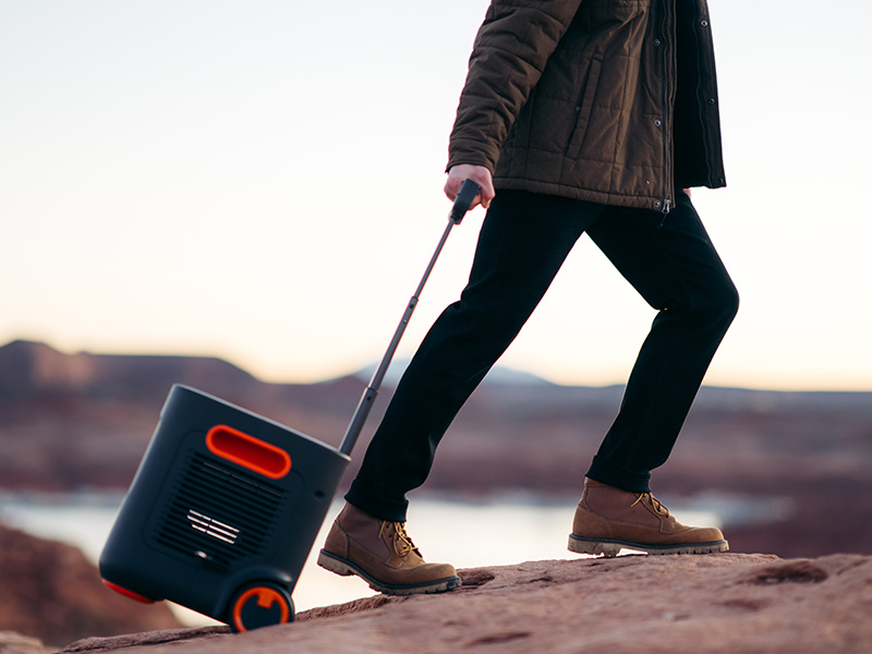 Person rolling a Jackery power station