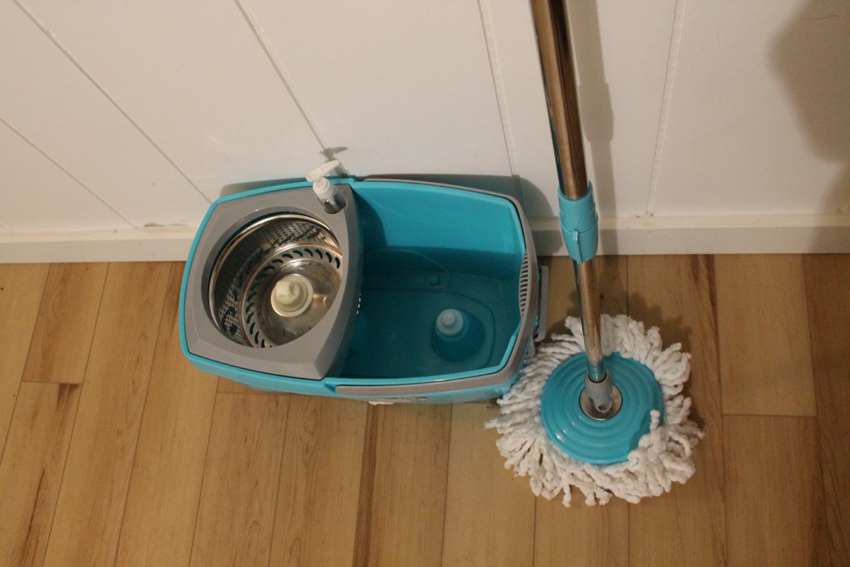 Tsmine Spin-Mop Bucket System resting on hardwood floor