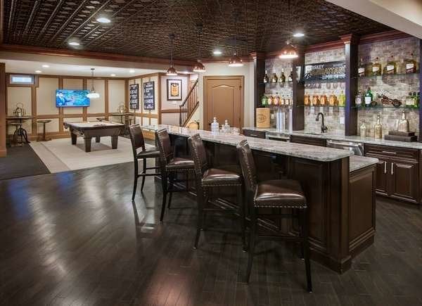 Finished basement with tin ceiling tiles