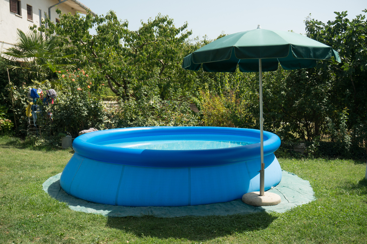 blue pasting pool with green umbrella