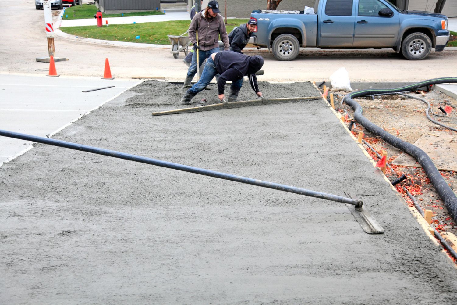 The Cost of Asphalt vs. Concrete Driveway Cost: 9 Factors to Consider ...