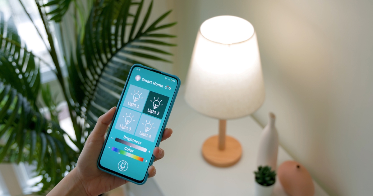 Person using phone to turn on light