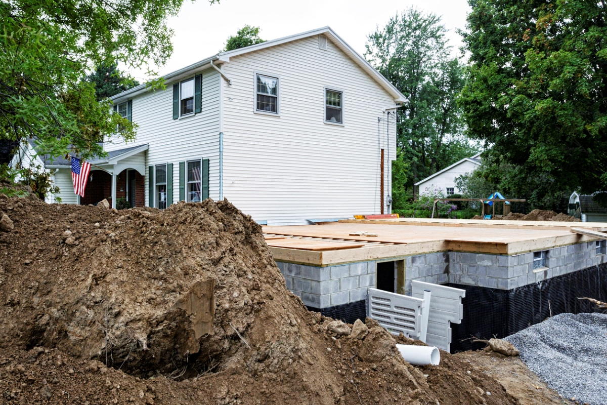 Construction in front of house